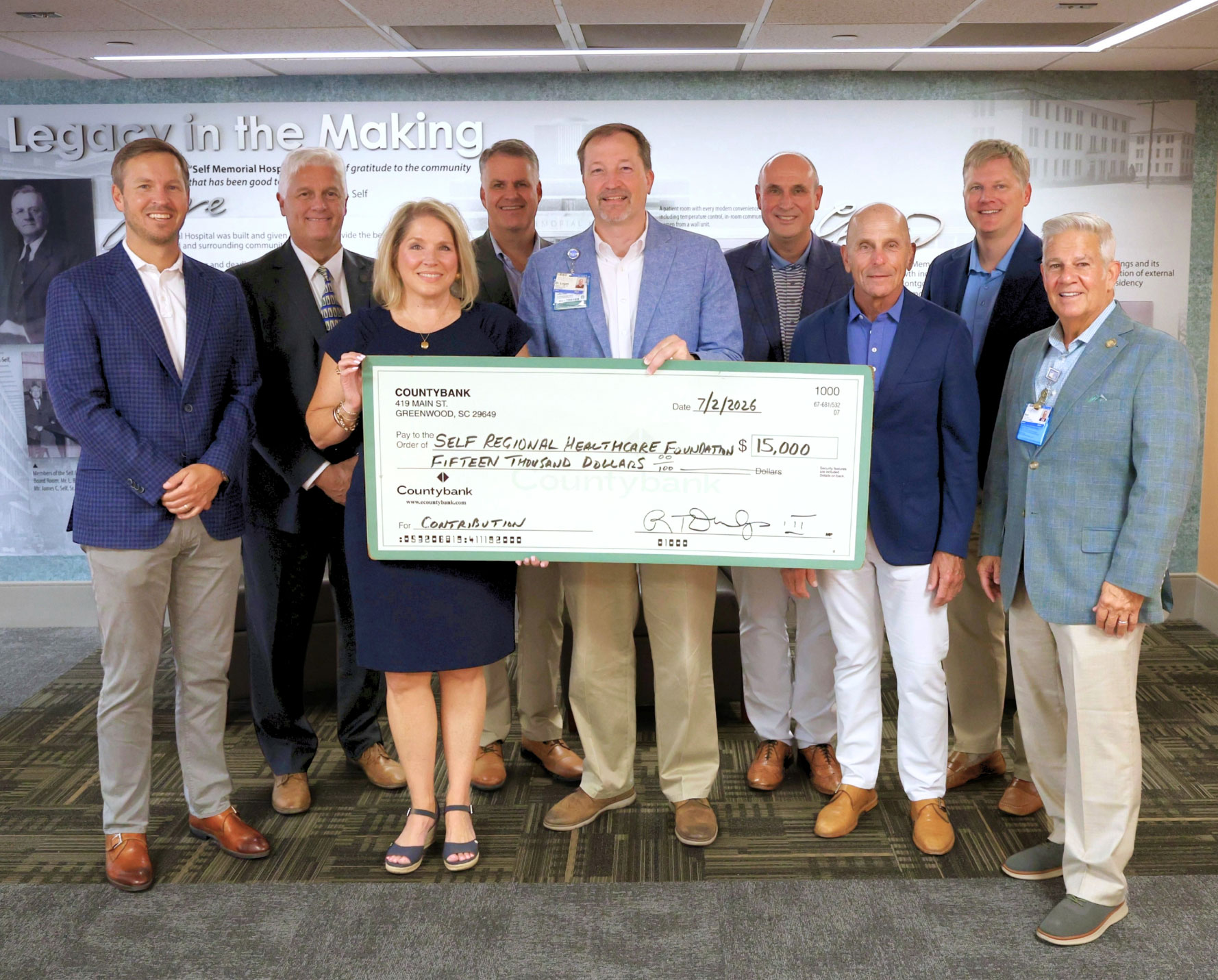 Pictured left to right: Countybank President Wells Dunlap, John Cooper, Dayle Mumford, John Wiseman, Self Regional Healthcare President and CEO Matthew Logan, David Tompkins, Countybank CEO Thornwell Dunlap, David Trent, and Self Regional Healthcare Foundation Executive Director Ken Coffey.